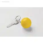 Llavero bola amarilla para logo